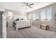 Main bedroom with large bed and windows at 14271 W Alameda Rd, Surprise, AZ 85387