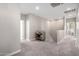 Upstairs hallway with neutral decor and carpet, plus access to bedrooms and a bathroom at 14271 W Alameda Rd, Surprise, AZ 85387