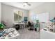 Home office with desk and whiteboard at 14271 W Alameda Rd, Surprise, AZ 85387