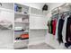 Large walk-in closet with ample shelving and hanging space at 14271 W Alameda Rd, Surprise, AZ 85387