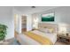 Spacious bedroom with a large bed, neutral decor and ample closet space at 14300 W Bell Rd # 65, Surprise, AZ 85374