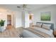Bright bedroom with plush bedding and built-in closet at 14300 W Bell Rd # 65, Surprise, AZ 85374