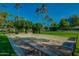 Well-maintained horseshoe pits with surrounding grass at 14300 W Bell Rd # 65, Surprise, AZ 85374