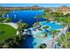 Resort-style pool with water features and lush landscaping at 17849 W Thistle Landing Dr, Goodyear, AZ 85338