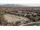 Community overview showcasing desert landscape and homes at 17849 W Thistle Landing Dr, Goodyear, AZ 85338