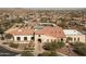 Community center with pool and surrounding landscape at 17849 W Thistle Landing Dr, Goodyear, AZ 85338