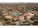 Community pool and clubhouse aerial view at 17849 W Thistle Landing Dr, Goodyear, AZ 85338