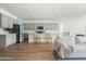 Open concept kitchen with light gray cabinets and island at 17849 W Thistle Landing Dr, Goodyear, AZ 85338