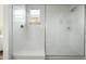 Large walk-in shower with glass enclosure and modern fixtures at 17849 W Thistle Landing Dr, Goodyear, AZ 85338