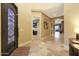 Spacious entryway with tile floors and views into the living areas at 18328 W Desert Trumpet Rd, Goodyear, AZ 85338