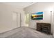 Bedroom with ample space, built-in shelving and a desk at 2042 E Aire Libre Ave, Phoenix, AZ 85022