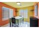 Small dining area with table and chairs, near kitchen at 2042 E Aire Libre Ave, Phoenix, AZ 85022