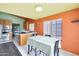 Bright kitchen features stainless steel appliances and an eat-in area at 2042 E Aire Libre Ave, Phoenix, AZ 85022