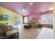 Living room with hardwood floors and sliding glass doors at 2042 E Aire Libre Ave, Phoenix, AZ 85022