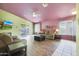 Living room featuring hardwood floors, and neutral color palette at 2042 E Aire Libre Ave, Phoenix, AZ 85022