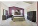 Large main bedroom with dark wood furniture and ceiling fan at 2042 E Aire Libre Ave, Phoenix, AZ 85022