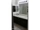 Double vanity bathroom with granite countertops and a separate shower at 25696 W Williams Ct, Buckeye, AZ 85326