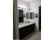 Bathroom with double vanity and granite countertops at 25696 W Williams Ct, Buckeye, AZ 85326