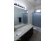 Bathroom with granite countertop and shower/tub combo at 25696 W Williams Ct, Buckeye, AZ 85326
