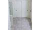 Clean bathroom with shower and double doors at 25696 W Williams Ct, Buckeye, AZ 85326