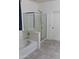 Bathroom with a bathtub and a shower stall at 25696 W Williams Ct, Buckeye, AZ 85326