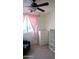 Bedroom with bunk beds and pink curtains at 25696 W Williams Ct, Buckeye, AZ 85326