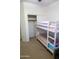 Bedroom with bunk beds and closet at 25696 W Williams Ct, Buckeye, AZ 85326