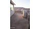 Private rooftop deck with metal railings and city views at 25696 W Williams Ct, Buckeye, AZ 85326