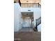Spacious entryway with high ceilings and elegant staircase at 25696 W Williams Ct, Buckeye, AZ 85326
