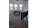 Game room with foosball table and high windows at 25696 W Williams Ct, Buckeye, AZ 85326