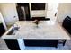 Spacious kitchen island with granite countertops and stainless steel sink at 25696 W Williams Ct, Buckeye, AZ 85326