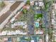 Aerial view of the community displaying pools, parking, landscaping and proximity to the canal at 4540 N 44Th St # 41, Phoenix, AZ 85018