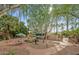Community courtyard with seating area, trees, and a mailbox area at 4540 N 44Th St # 41, Phoenix, AZ 85018