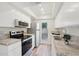 Well-lit kitchen with stainless steel appliances, light countertops, and ample cabinet space at 4540 N 44Th St # 41, Phoenix, AZ 85018