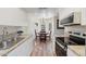 Efficient kitchen with stainless steel appliances and an adjacent breakfast nook with natural lighting at 4540 N 44Th St # 41, Phoenix, AZ 85018