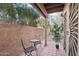 Small patio with table and chairs, ideal for relaxing at 4540 N 44Th St # 41, Phoenix, AZ 85018