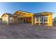 New construction home under construction, showing framing and open patio at 7577 W Evans Dr, Peoria, AZ 85381