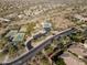 Aerial view of community amenities including tennis courts and pool at 10671 E Caribbean Ln, Scottsdale, AZ 85255