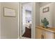 View into bedroom from hallway showcasing a cozy interior at 10671 E Caribbean Ln, Scottsdale, AZ 85255