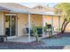 Covered patio with seating area and grill at 13502 W Hyacinth Dr, Sun City West, AZ 85375