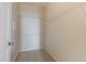 Walk-in closet featuring wire shelving and neutral carpeting at 14575 W Mountain View Blvd # 11317, Surprise, AZ 85374