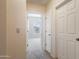 Hallway leading to a bedroom at 14575 W Mountain View Blvd # 11317, Surprise, AZ 85374