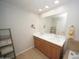 Bright bathroom featuring a double vanity with modern fixtures and a large mirror at 16 W Encanto Blvd # 609, Phoenix, AZ 85003
