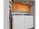 Convenient laundry room with washer, dryer, and cabinets at 16 W Encanto Blvd # 609, Phoenix, AZ 85003