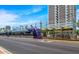 Exterior view of the Light Rail at the Encanto/Central Ave stop with a clear blue sky and modern city architecture at 16 W Encanto Blvd # 609, Phoenix, AZ 85003