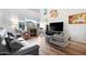 Spacious living room with fireplace and hardwood floors at 16 W Encanto Blvd # 609, Phoenix, AZ 85003