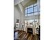 Bright living room with large windows, fireplace, and balcony access offers a cozy and modern feel at 16 W Encanto Blvd # 609, Phoenix, AZ 85003