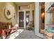 Inviting courtyard entry with a seating area and tile flooring at 18626 E Amarado Cir, Rio Verde, AZ 85263