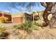 Single-story home with desert landscaping and a two-car garage at 18626 E Amarado Cir, Rio Verde, AZ 85263