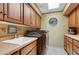 Laundry room with washer, dryer and built in cabinets at 18626 E Amarado Cir, Rio Verde, AZ 85263